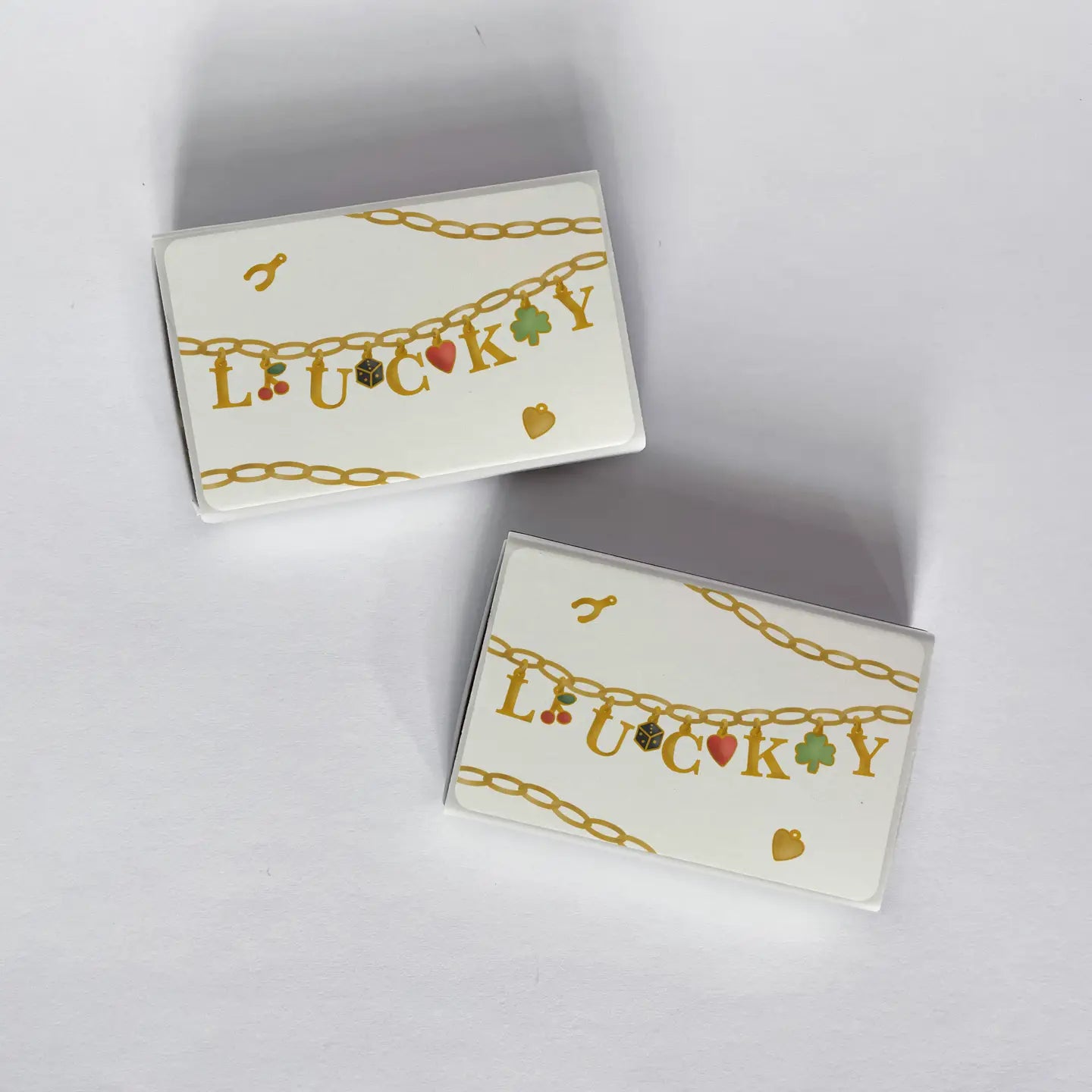 Lucky Charms Gold Charm Bracelet Matchbook